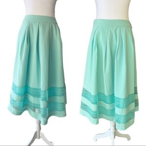 JOA - Los Angeles Aqua Blue midi Aline skirt w/ organza stripe panels at bottom.